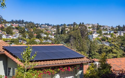 a house with solar panel on the roof