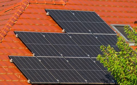 close up of solar panels on a roof of a house