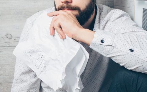 man in long sleeve button down shirt