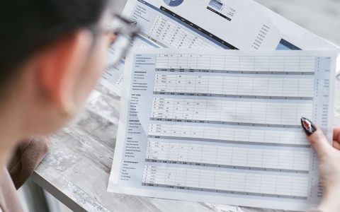 a person holding a document