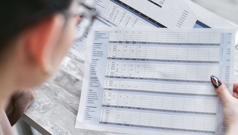 a person holding a document
