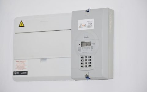 electricity box on white wall