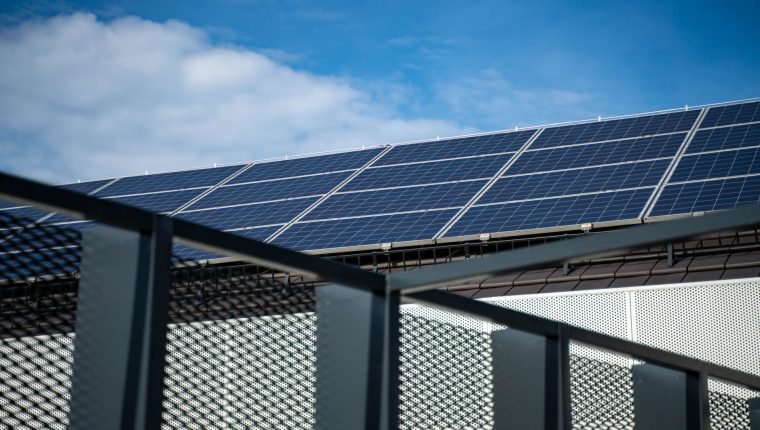 blue solar panels on the roof