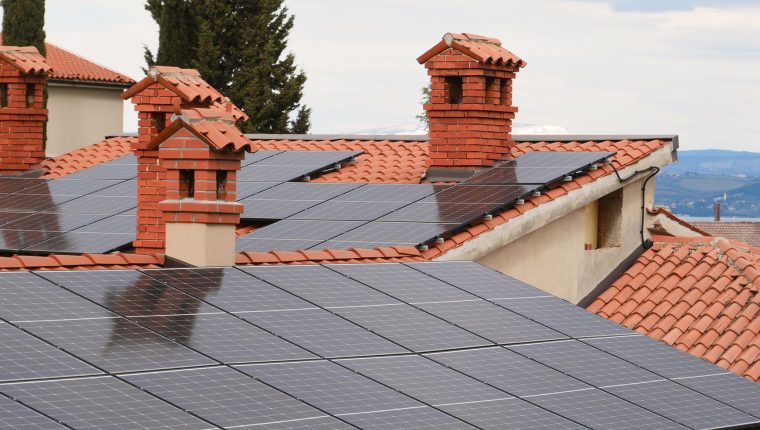 solar panels on tiled roofs in residential area