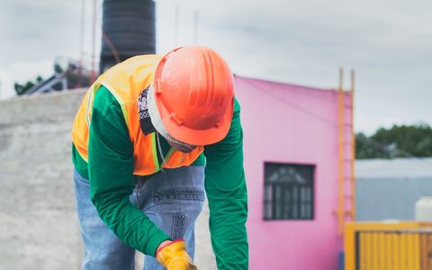 maintenance guy in orange hard hat