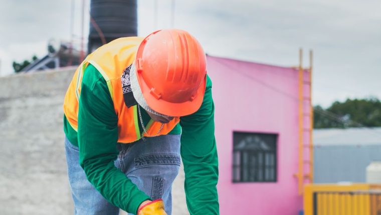 maintenance guy in orange hard hat