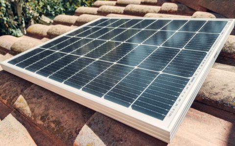 a solar panel on roof tiles