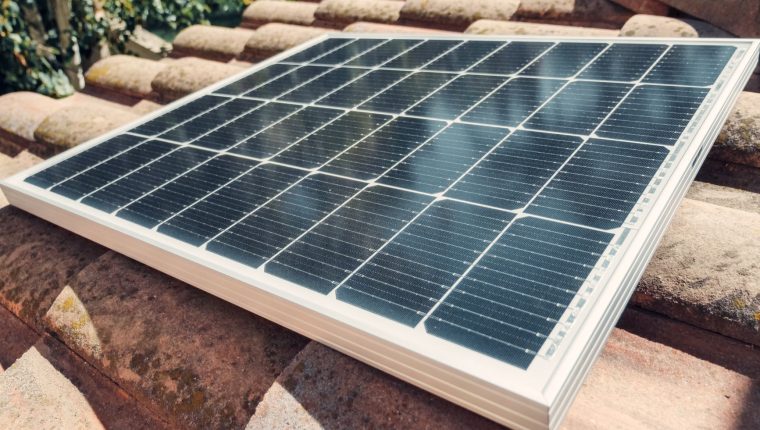 a solar panel on roof tiles